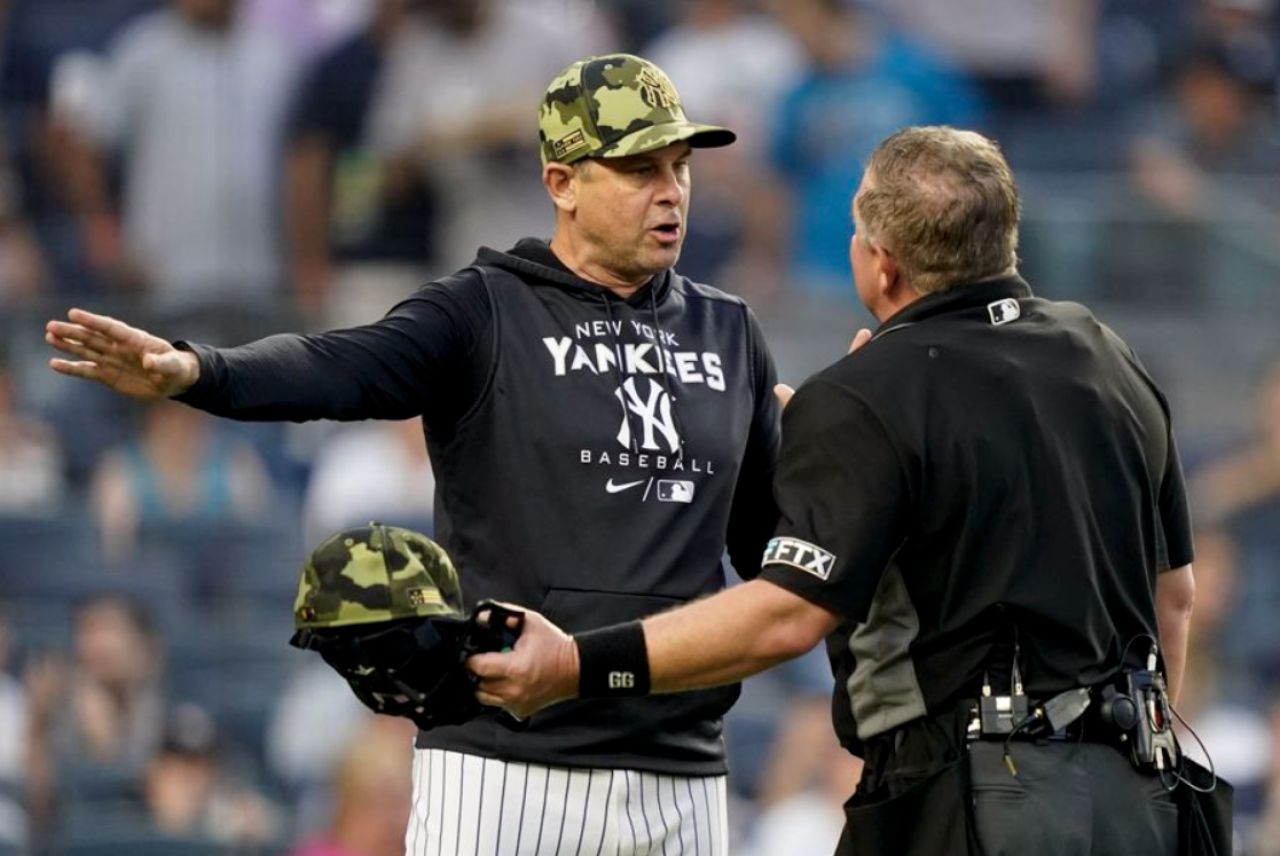 Controversial Ejection: Yankees&#039; Boone Tossed by Umpire in Game Against Oakland