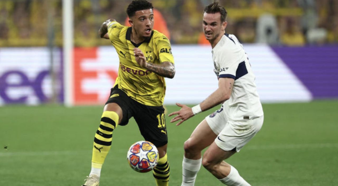 Sancho Sparkles as Dortmund Nudge Past PSG: Champions League Drama Unfolds!
